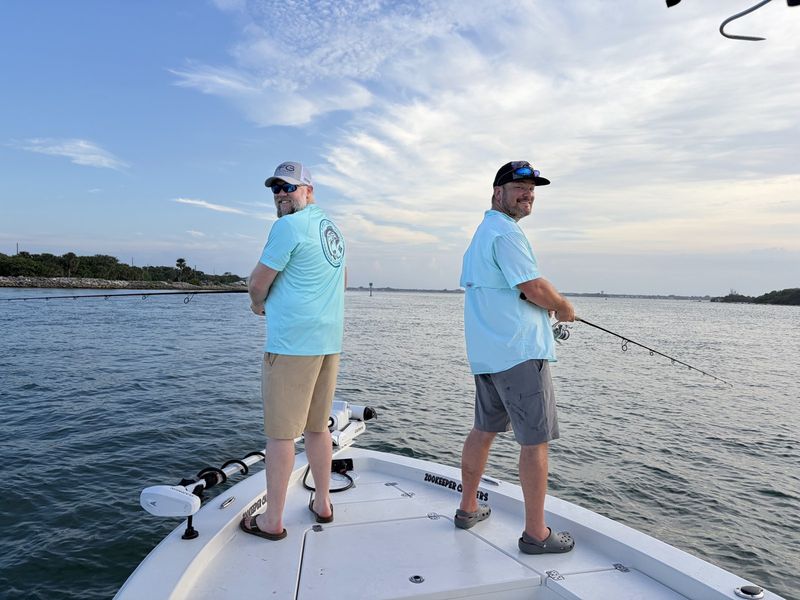 Two anglers casting from the bow on the lagoon near Sebastian Inlet