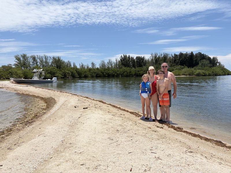 Family on the sandbar near Sebastian Inlet
