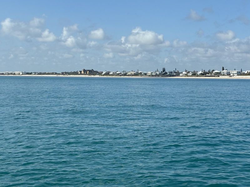 Blue water along the coast outside the inlet